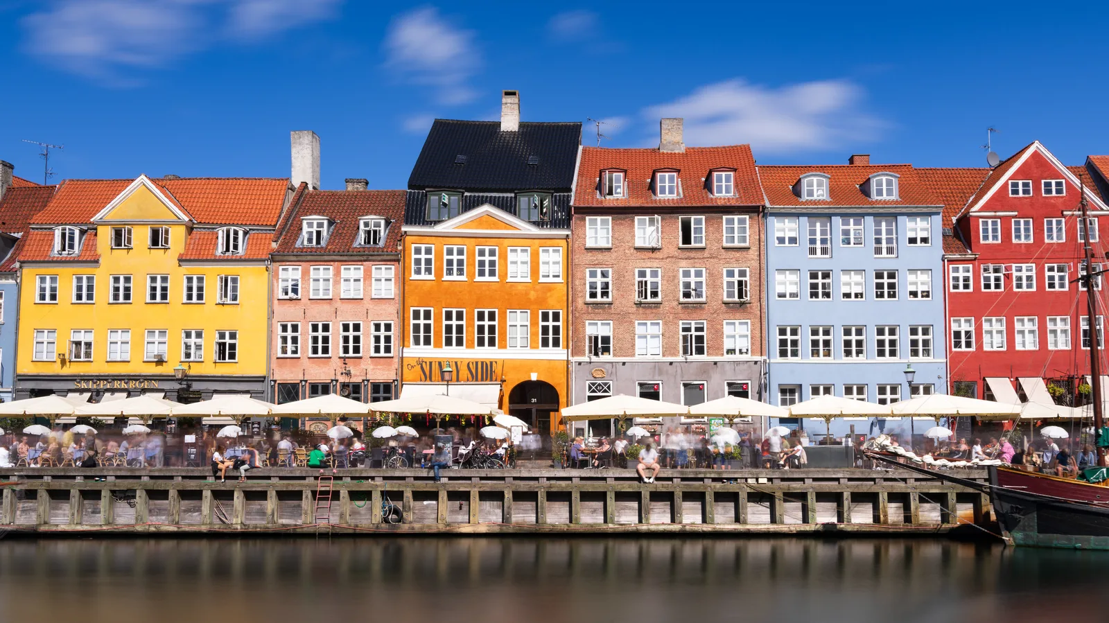 Picturesque cobblestone lane with colorful houses