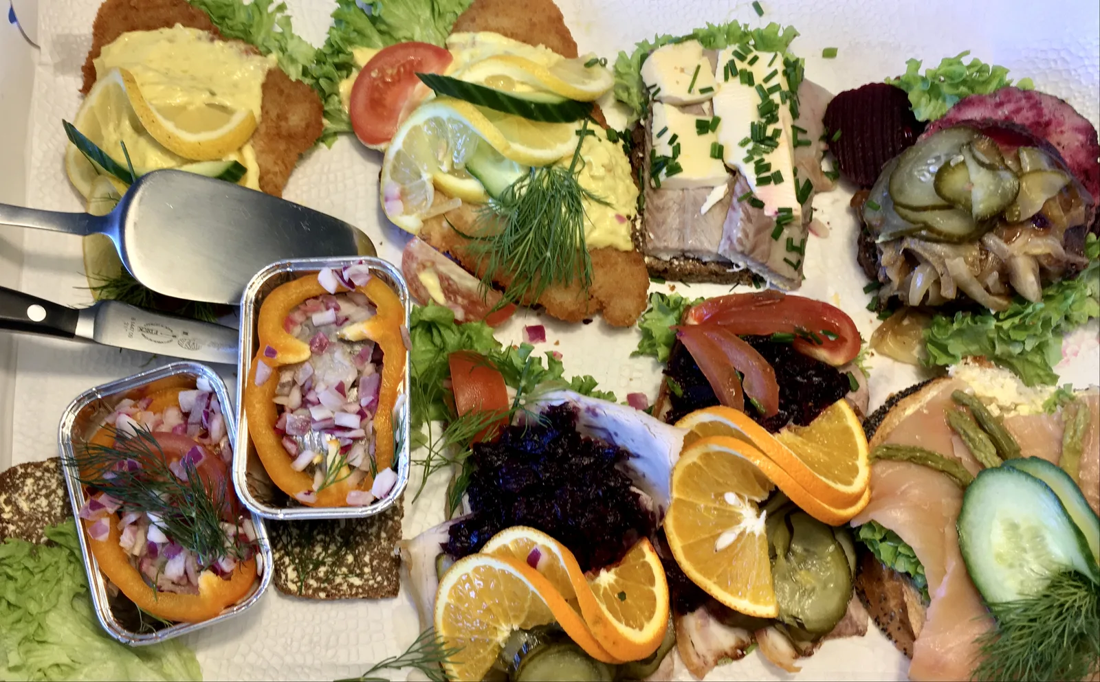 Traditional Danish smørrebrød open-faced sandwich with rye bread and fresh toppings in Copenhagen