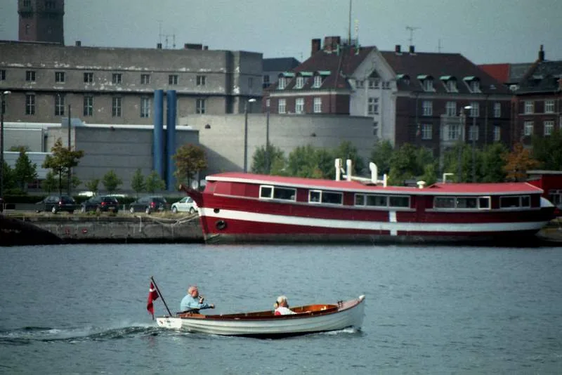 Copenhagen boat tour and harbor area from a water perspective showing boats and canal scenery