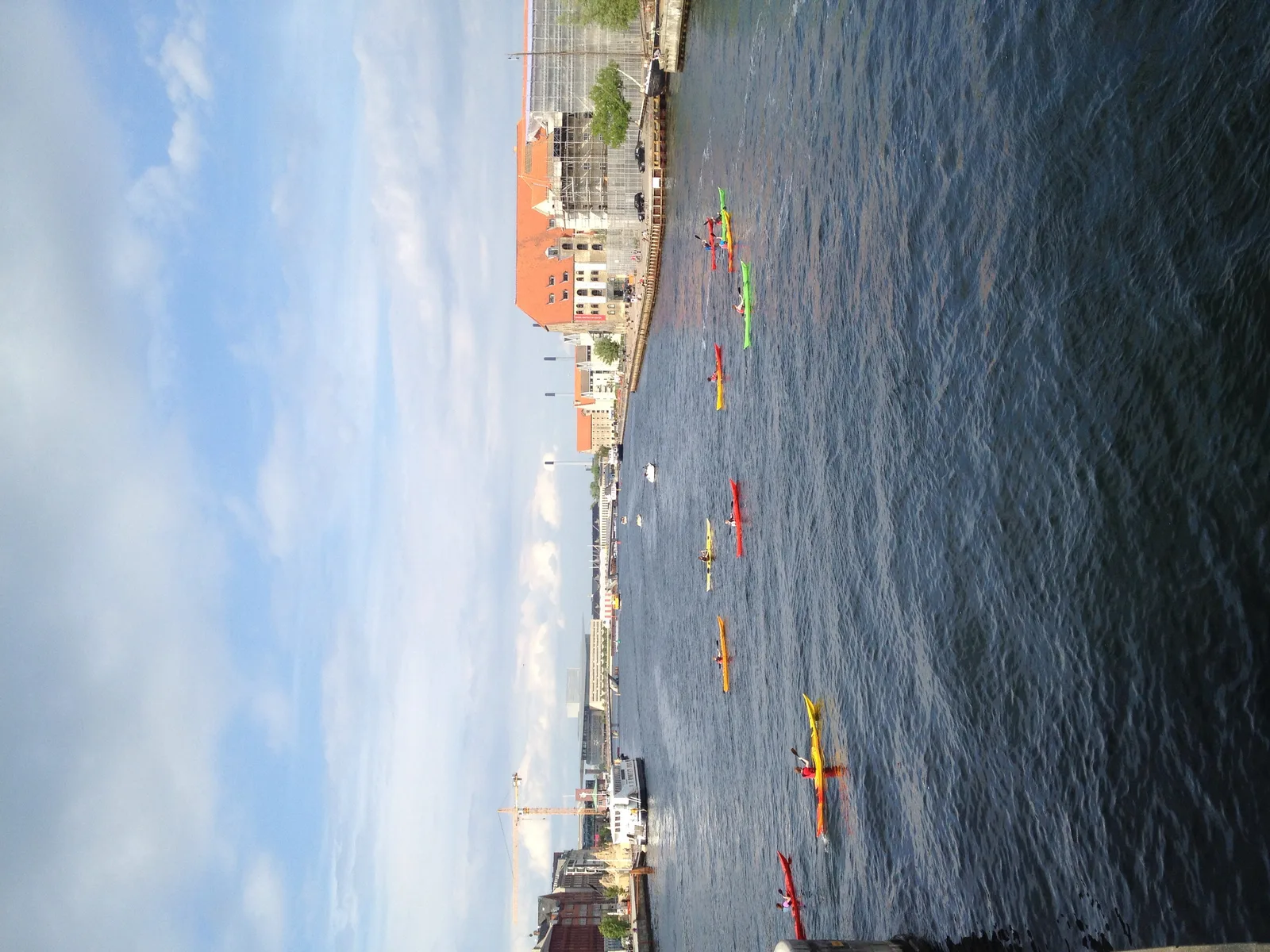 Copenhagen boat tour and harbor area from a water perspective showing boats and canal scenery