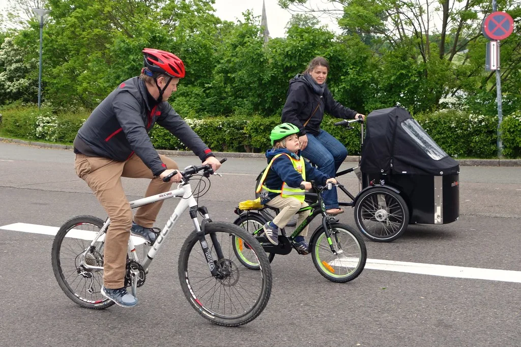 Cyclist riding through Copenhagen's segregated bike lanes