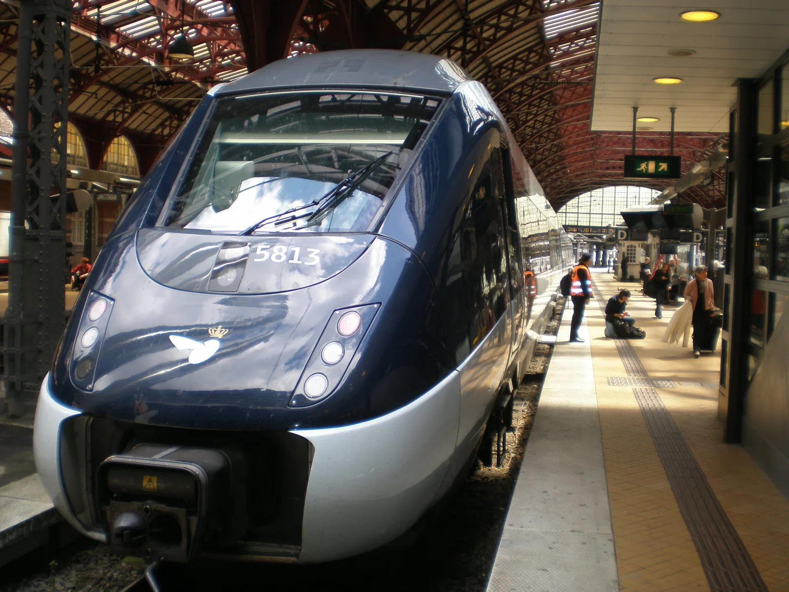 Interior of InterCityLyn express train showing comfortable seating, modern amenities, and quiet zone on route through Denmark