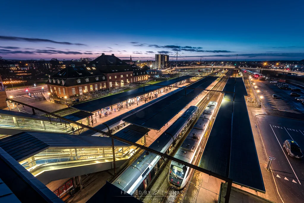 Odense Central Station entrance with modern architecture and city square