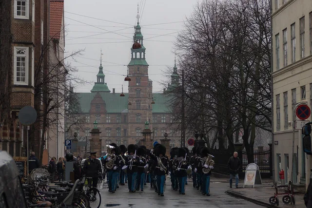 Guards in ceremonial uniform during the changing of royal guards at Amalienborg Palace Copenhagen