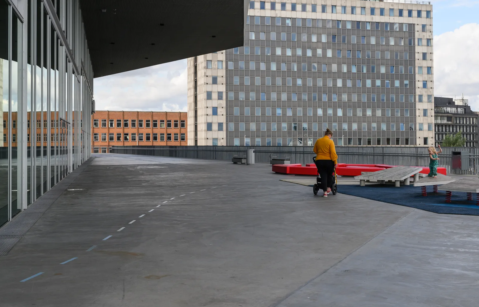 Aarhus Airport terminal with modern architecture and boarding passengers
