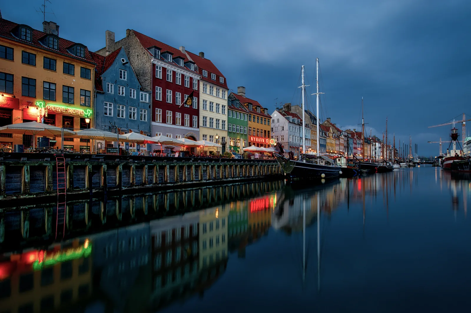 Nyhavn Canal with historic colorful buildings and waterfront in Indre By, Copenhagen, Denmark